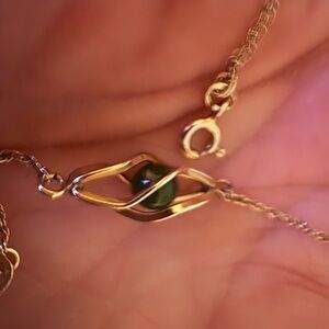 Elegant Gold and Green Jade  bracelet.